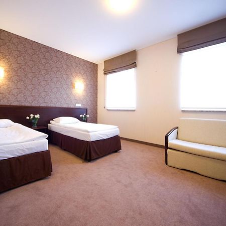 Hotel Centrum Квидзын Экстерьер фото